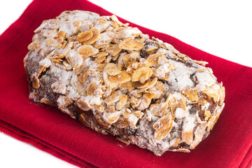A Traditional Stollen with Fruit and Almond Paste topped with Almonds