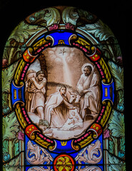 Obraz premium Early 20th century stained glass depicting the nativity scene in St Joseph sanctuary, Espaly St Marcel (Auvergne, France)