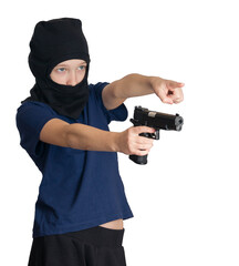 boy in balaclava or mask with a pistol in his hands points to the target, on an isolated background. symbol of child crime.