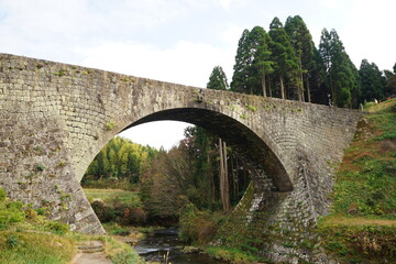 Fototapeta na wymiar Tsujun Bridge, Traditional Arch Bridge, without flowing water in Kumamoto, Japan - 日本 熊本県 通潤橋