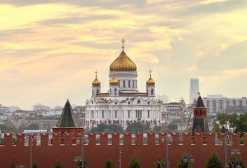 Cathedral Of Christ The Saviour. White stone architecture of the XIX century, Golden domes, walls of the Moscow Kremlin