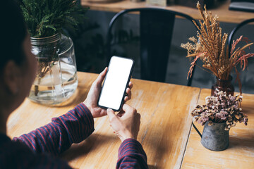 cell phone blank white screen mockup.woman hand holding texting using mobile on desk at office.background empty space for advertise.work people contact marketing business,technology