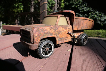 Rusty old toy dump truck