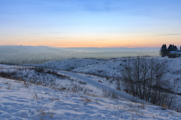 Winter landscape with snow at dusk