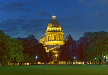 Night city. View of the dome of St. Isaac's Cathedral in the night lights against the blue predawn...