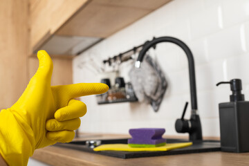Housekeeper cleaning the kitchen