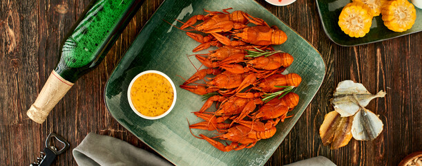 Crayfish-boiled river crayfish on a dark wooden background.Space for text.