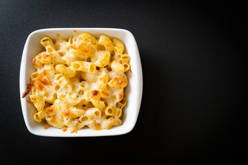 American mac and cheese, macaroni pasta in cheesy sauce