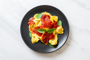 Italian tortellini pasta with tomato sauce