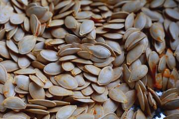 Fresh, white pumpkin seeds ready to be cooked