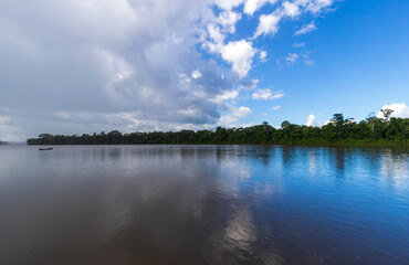 Gentle Rain Overcast With Half Cloudy Half Blue Sky And Suriname River View. Landscape Nature Scenery In South America.