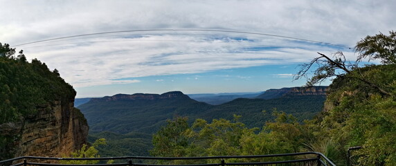 Beautiful panoramic view of tall mountains and deep valleys, Three Sisters Lookout, Blue Mountain National Park, New South Wales, Australia
