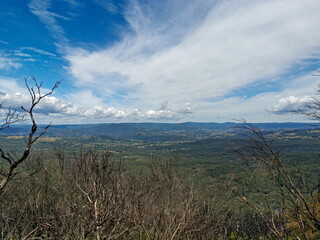 Beautiful view of mountains and valleys with burned out bushes and trees, Narrow Neck Lookout, Blue Mountain National Park, New South Wales, Australia
