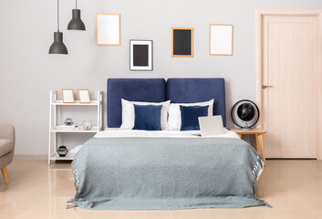 Stylish interior of modern bedroom