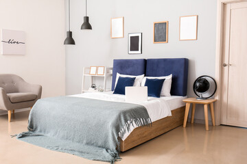 Stylish interior of modern bedroom