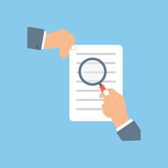 Hand Holding Magnifying Glass