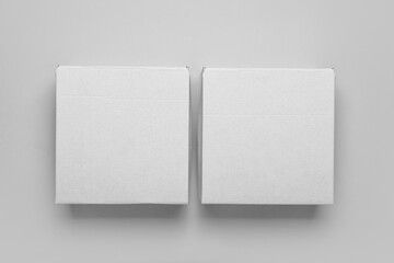 Blank cardboard boxes on light background
