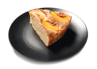Plate with piece of tasty peach pie on white background