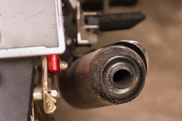 old motorcycle exhaust pipe dirty