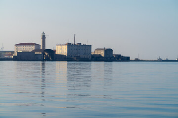 Fototapeta premium La Lanterna Lighthouse at Adriatic Sea Harbour in Trieste, Italy
