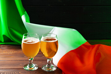 Glass of beer against flag of Ireland