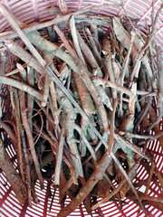 close up of small dried branches rusty wood sticks Many small branches, twigs in the basket.