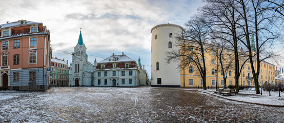 Panoramic view of Riga Castle during sunny winter snowy day in Riga, Latvia. Riga Castle is a castle on the banks of River Daugava. Today it is the official residence of the President of Latvia.