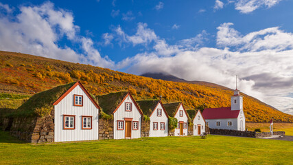Fototapeta na wymiar Open air Museum Laufas with historical turf houses and wooden church in Iceland