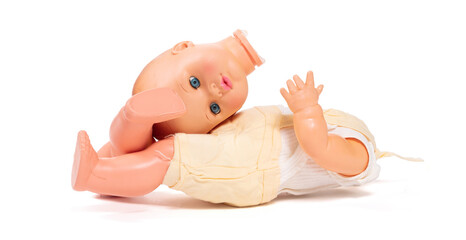 Broken old doll, isolated