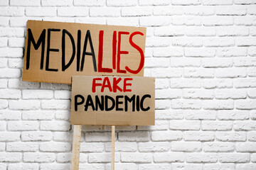 Protest placard against fake news about outbreak 2019-nCoV and treatment