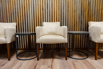 Office waiting area with arm chairs and coffee table