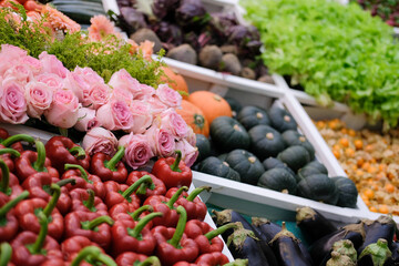 rose flower vegetable on shelf at market.