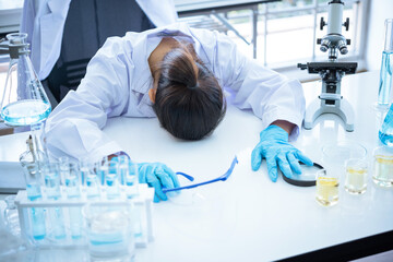 Scientist woman feeling upset desperate serious stressed having problems debt, he sleep on table...