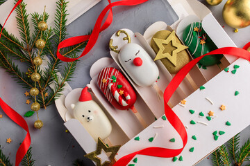 set of Christmas cookies on a stick. christmas popsicles