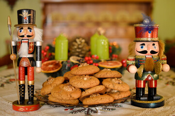 pile of ginger cookies ant nutcracker soldiers at the table