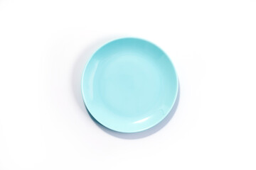 Empty Turquoise plate isolated on white background top view