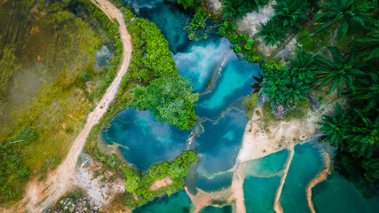 Abstract crystal clear Emerald pool during sunrise. Aerial Photography.