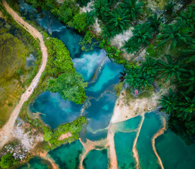 Abstract crystal clear Emerald pool during sunrise. Aerial Photography.