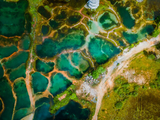 Abstract crystal clear Emerald pool during sunrise. Aerial Photography.