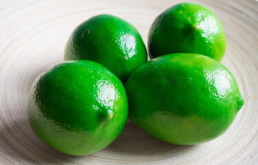 Fototapeta na wymiar lime close-up, green colored fruits.