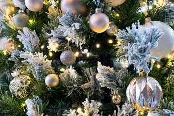 Close up of balls on christmas tree. New Year concept.