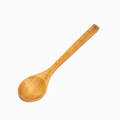 A small wooden spoon isolated on a white background