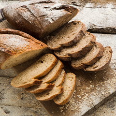 Two types of homemade bread on a cutting board, gluten free. Organic diet food, for people that thinks of their health.