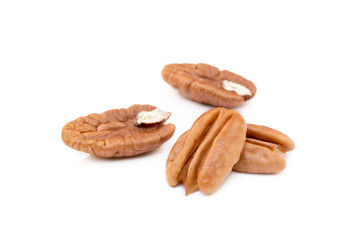 Fresh pecan nuts isolated on white background