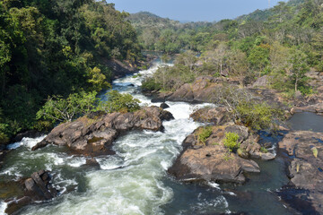 waterfalls, dam shutter and river bed in india kerala thenmala kerala eco tourism projects. beauty of Gods own country