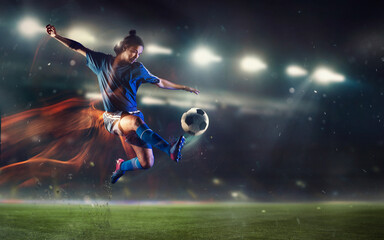 Naklejka premium Speed. Young male soccer or football player kicking ball during match at the stadium in flashlights, spotlights. Concept of professional sport, motion, movement. 3D render. Flyer for ad.