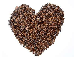 From above of lots of small dark brown coffee beans in form of heart in light of lamps on white background 