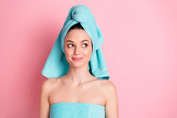 Portrait of young happy positive lovely cute dreamy girl look copyspace wear teal turban isolated on pink color background