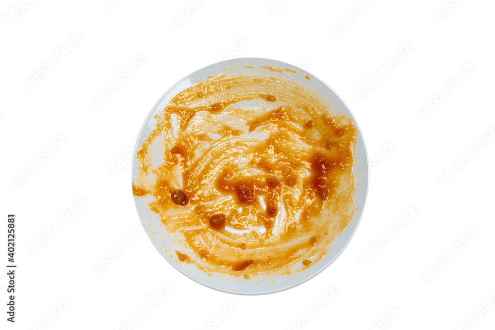 Wall mural empty white round ceramic and dirty dish after food with red sauce top view isolated on white backgr