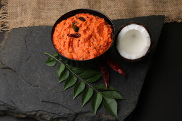 bowl of indian red chutney, coconut chutney.